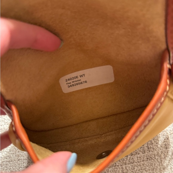 Dooney & Bourke Oncour Twist Flap Wristlet - Picture 6 of 6